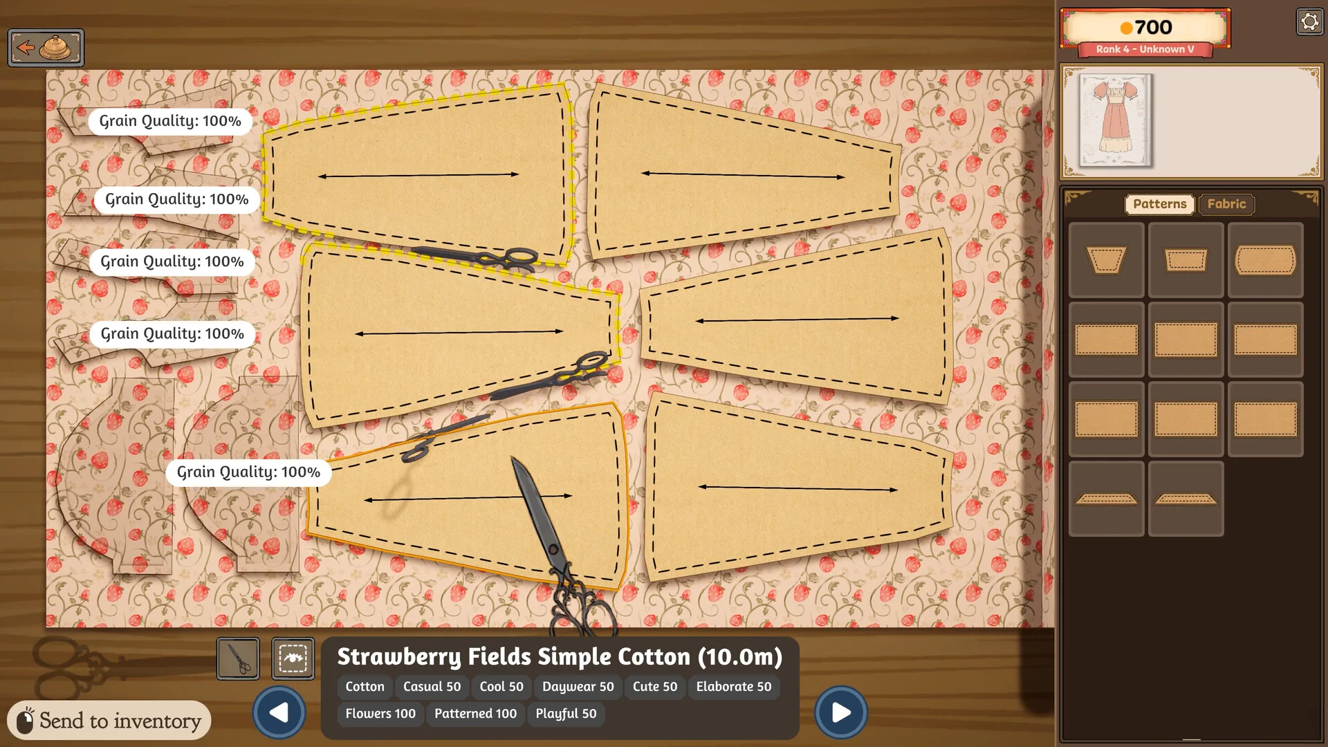 Pattern pieces arranged on fabric at the cutting table
